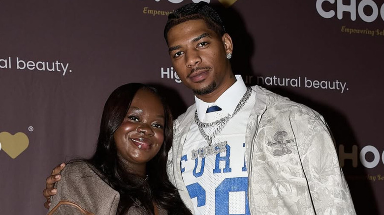 Cori Broadus and Wayne Duece posing on red carpet at an event