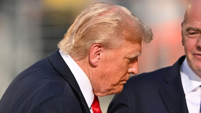 Donald Trump hunched over at the FIFA Club World Cup