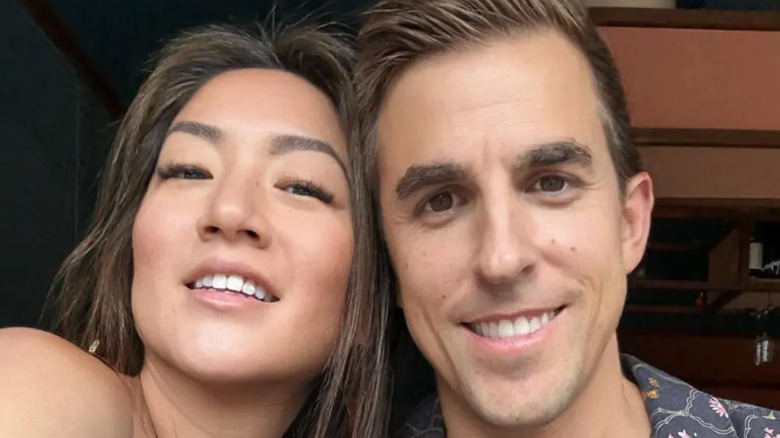 Janice and David Gott posing for cameras.