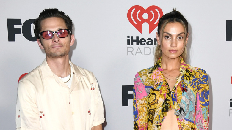 Travis Schneider and Whitney Wagner Hartley at the 2022 iHeartRadio Music Awards.