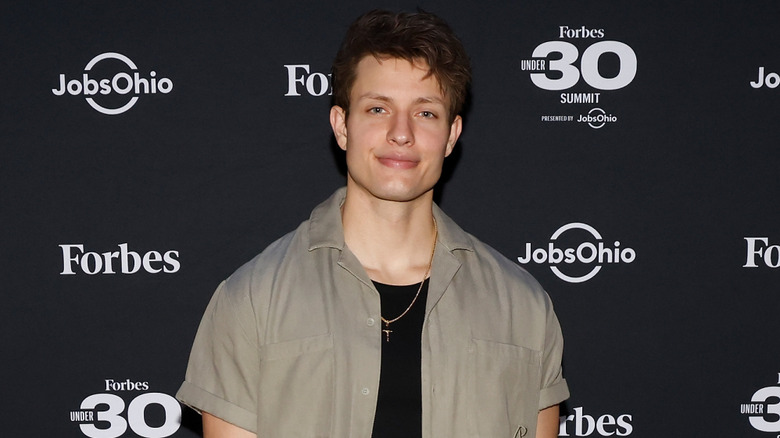 Matt Rife smiling at the 2023 Forbes 30 Under 30 Summit at Cleveland Public Auditorium