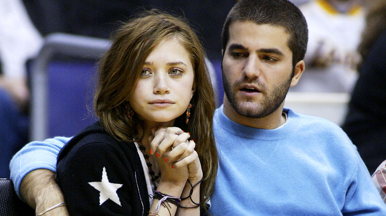 David Katzenberg and Mary-Kate Olsen cuddling  