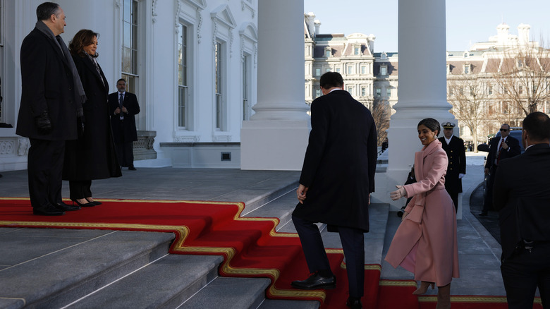 Doug Emhoff, Kamala Harris, JD Vance and Usha Vance meet one another at the White House.