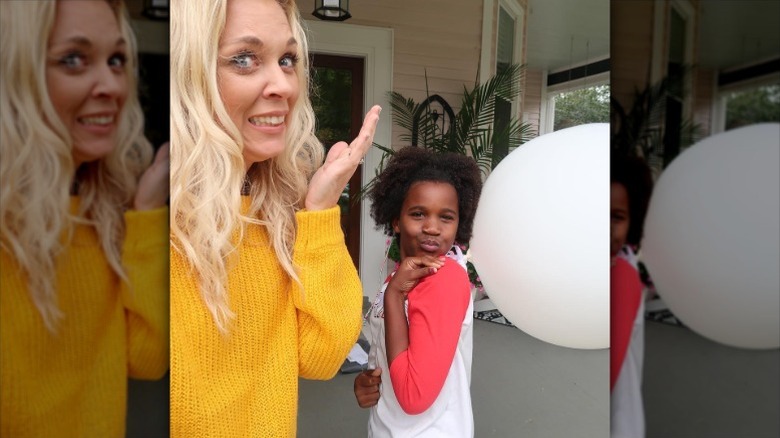 Kortney Wilson makes funny faces with her daughter Lennox