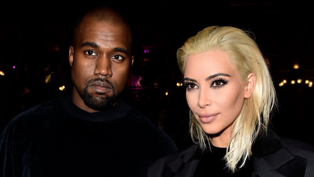 Kanye West and Kim Kardashian West at the Balmain show during Paris Fashion Week in 2015