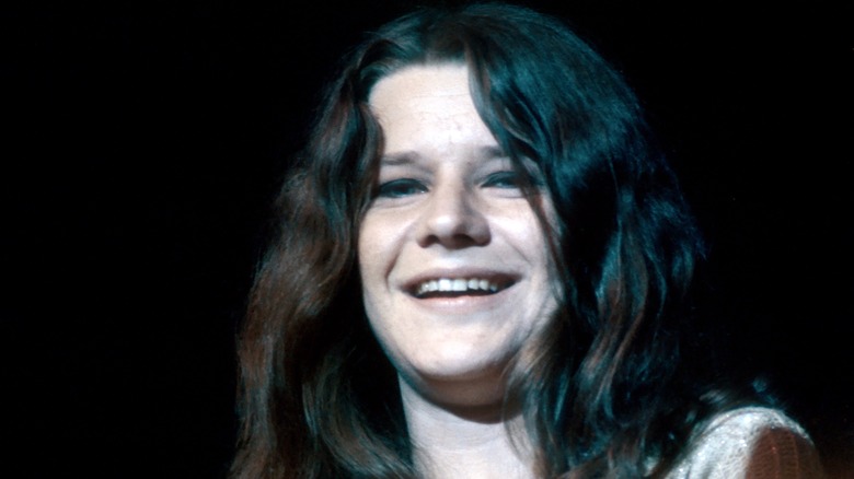 Janis Joplin smiling on stage