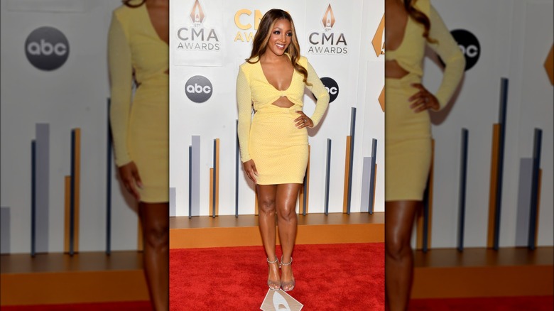 Mickey Guyton posing