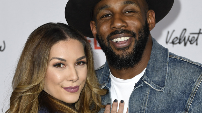 Stephen "tWitch" Boss and Allison Holcker embracing