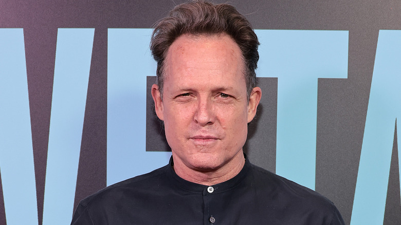 Dean Winters posing