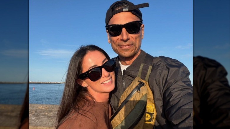 Tristyn & Kamohai Kalama smiling while posing for a photo in sunglasses