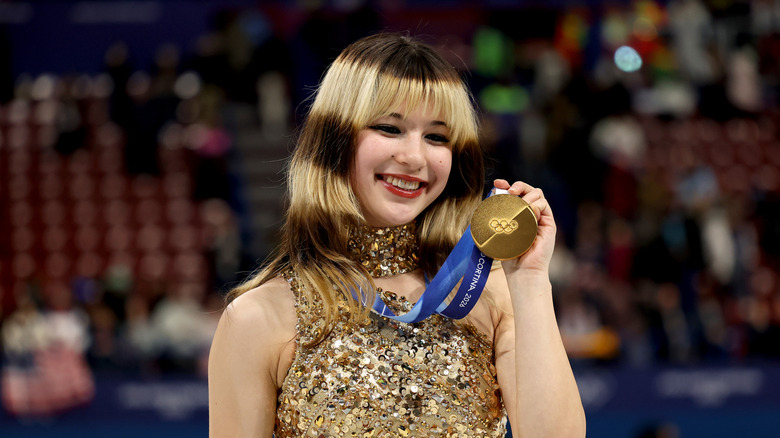 Alysa Liu poses with her gold medal at the 2026 Winter Olympics in Milan