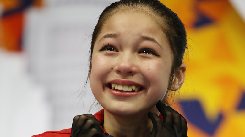 Alysa Liu reacts after moving into first place during the 2019 U.S. Figure Skating Championships