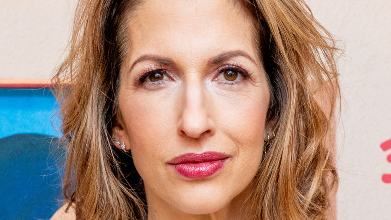 Alysia Reiner smiling on the red carpet