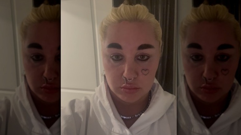 Amanda Bynes poses for a selfie in February 2026