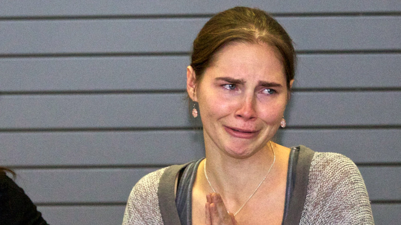 Amanda Knox, 2011 photo of her crying and looking sad 