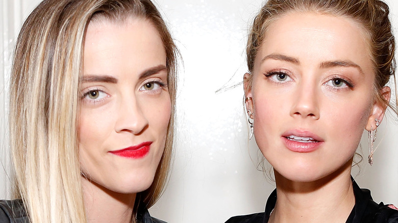 Whitney Heard (L) and Amber Heard attend the Art of Elysium presents Tom Franco