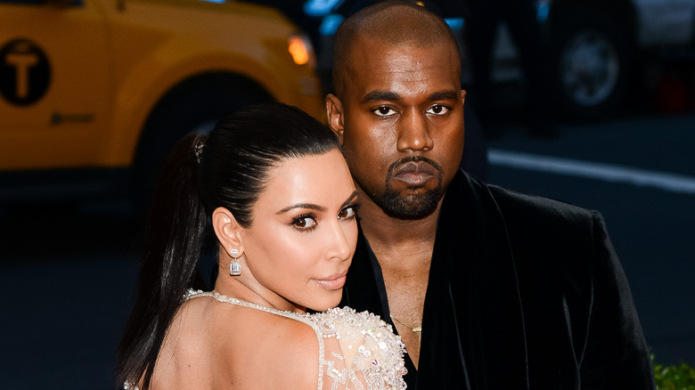 Kim Kardashian with Kanye West serious