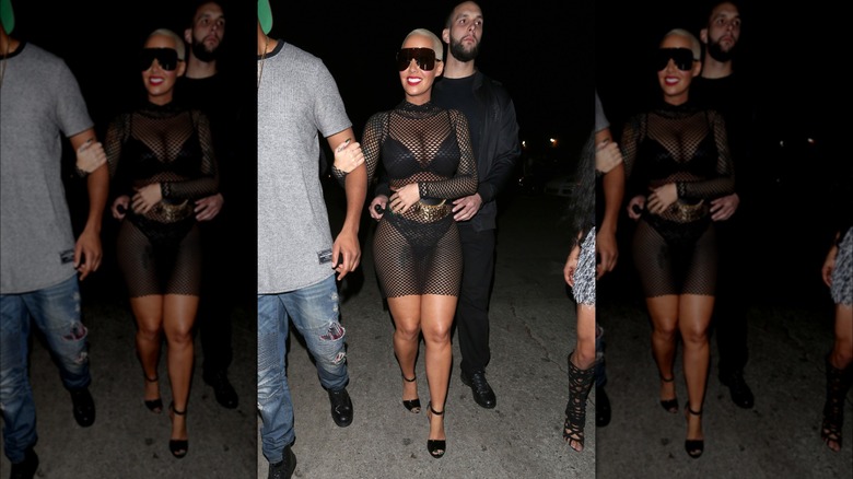 Amber Rose in black mesh dress