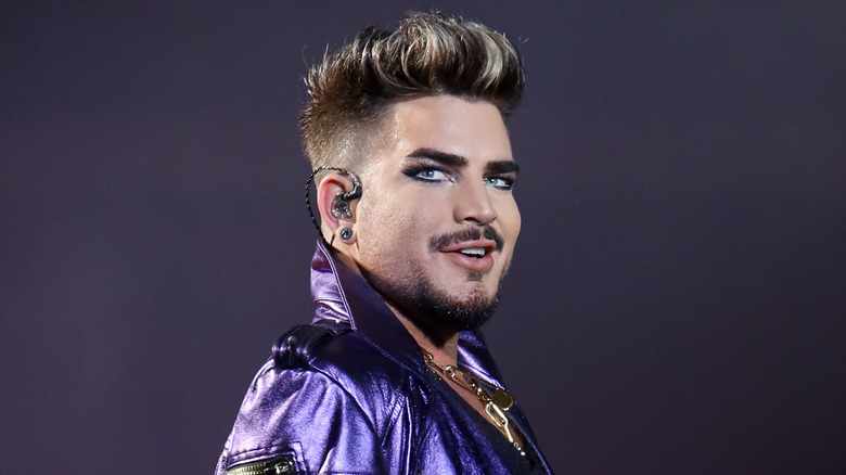 Adam Lambert wearing purple
