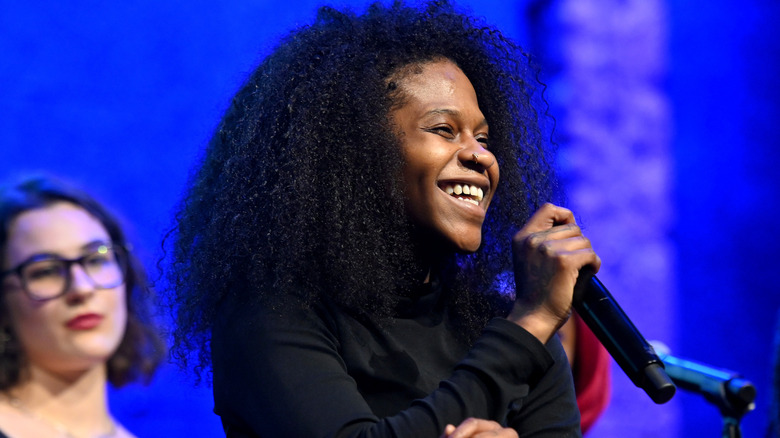 Just Sam performing on stage in New York City in 2022