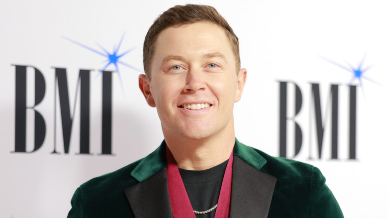 Scotty McCreery smiles at the 2024 BMI Country Awards in November 2024