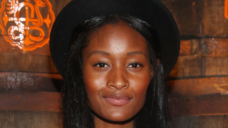 Danielle Evans wearing black hat
