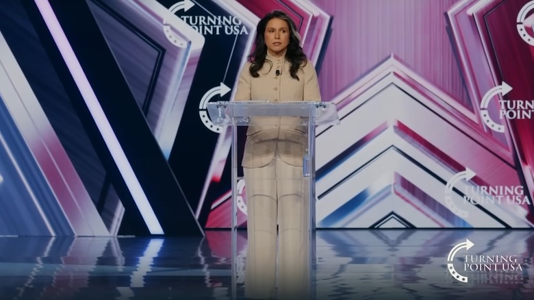 Tulsi Gabbard speaking at a podium