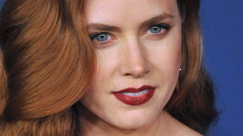 Amy Adams with her red hair pulled forward