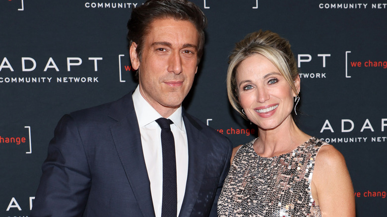 David Muir and Amy Robach pose 