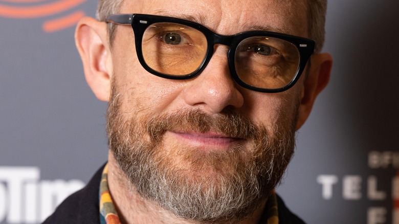 Martin Freeman smiling, tinted glasses