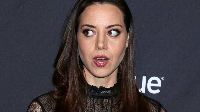 Aubrey Plaza poses
