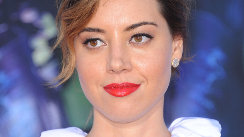 Aubrey Plaza smiles