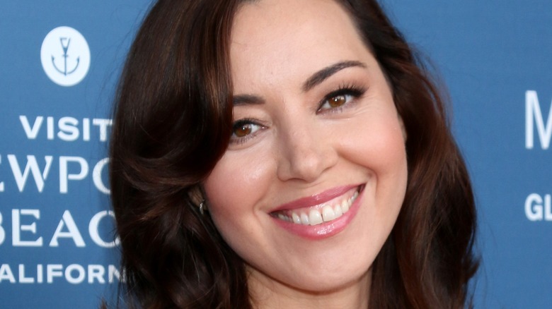 Aubrey Plaza smiles