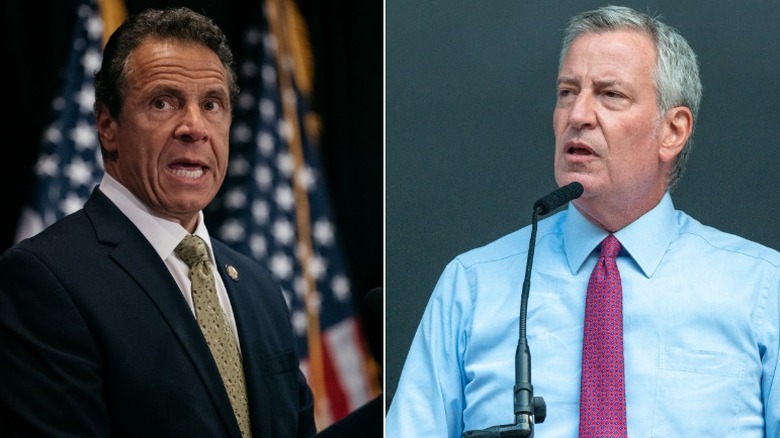 Andrew Cuomo and Bill de Blasio speaking at the podium
