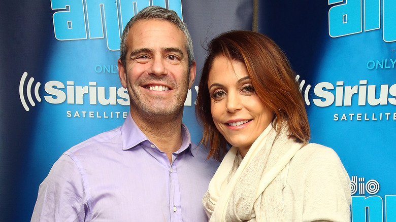 Andy Cohen and Bethenny Frankel smiling