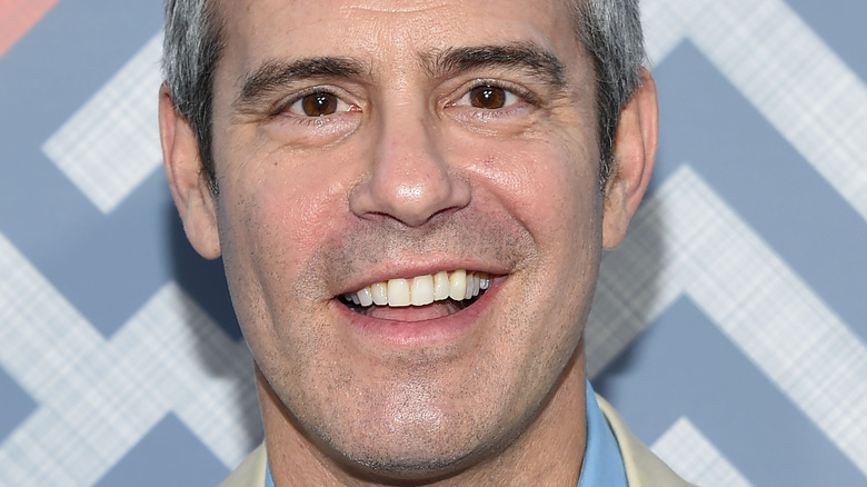 Andy Cohen smiling at an event
