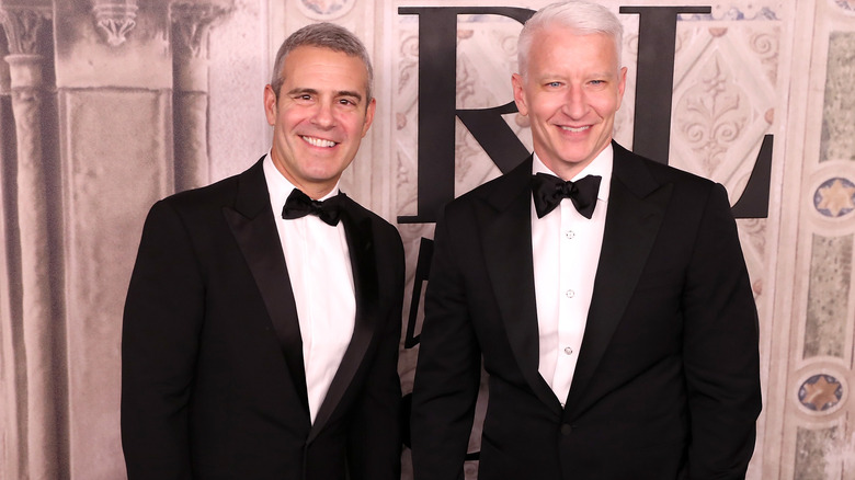 Andy Cohen and Anderson Cooper smiling