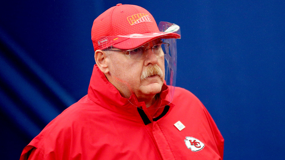 Andy Reid wearing a clear face shield on the field