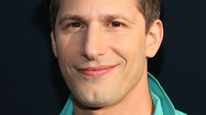 Andy Samberg slight smile