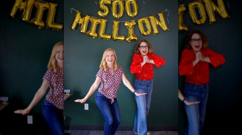 Angela Kinsey and Jenna Fischer posing together.