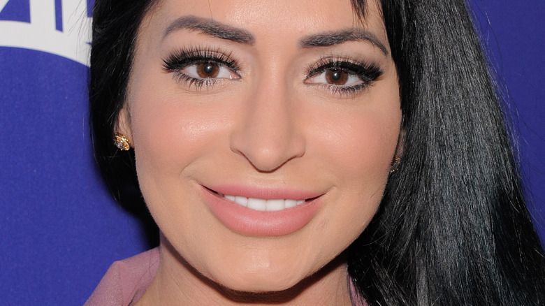 Angelina Pivarnick smiles on the red carpet