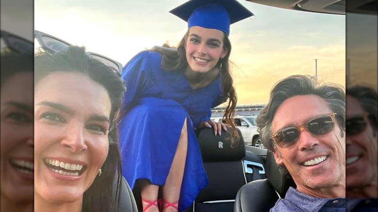 Angie Harmon, Finley Faith Sehorn and Jason Sehorn posing
