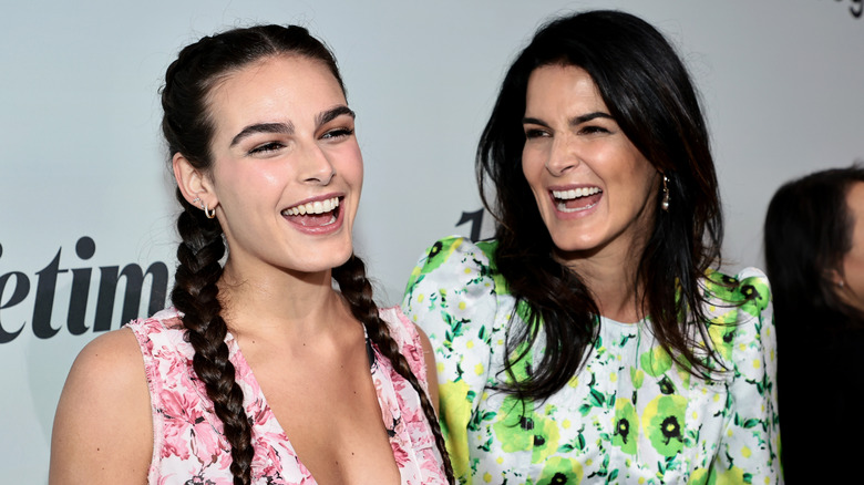 Angie Harmon and Finley smiling
