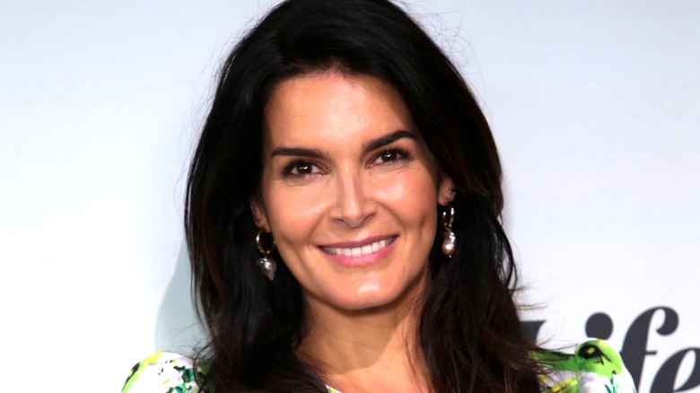 Angie Harmon smiling