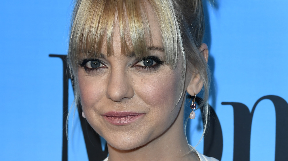 Anna Faris wearing her hair in an updo on the red carpet