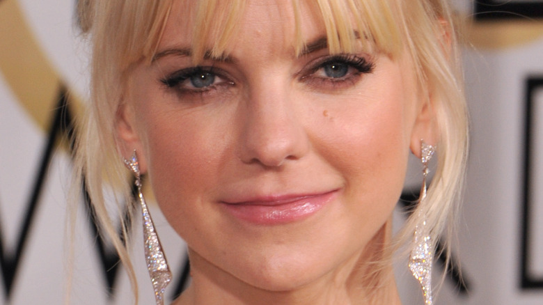 Anna Faris smiling slightly