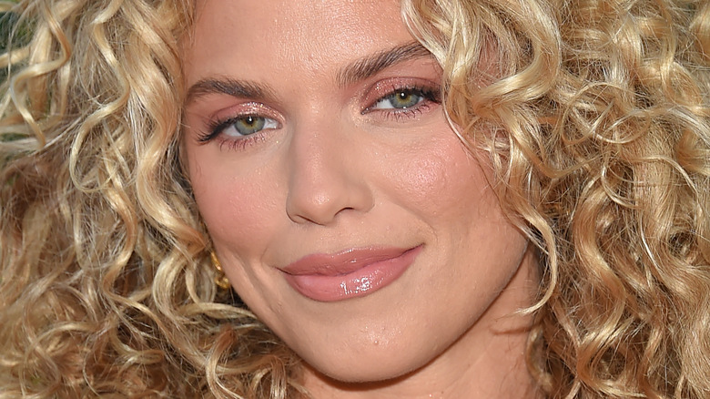 AnnaLynne McCord looks at camera