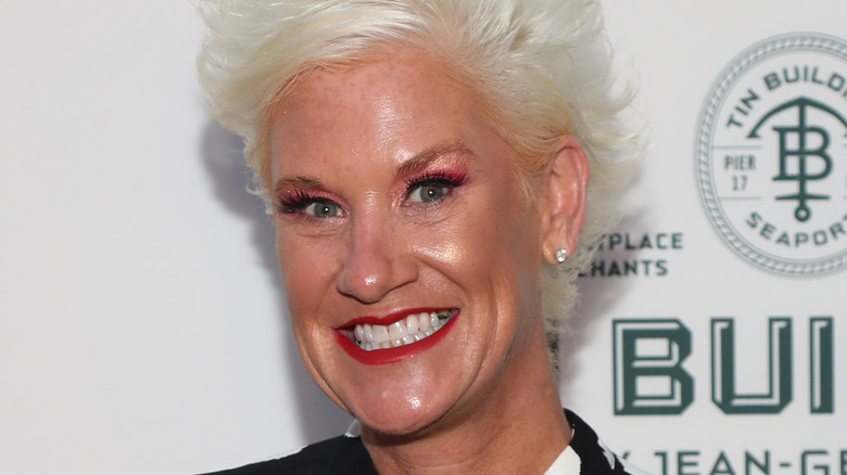 Anne Burrell posing at an event