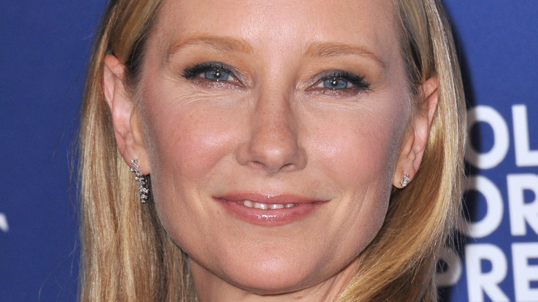 Anne Heche smiles for photos on the red carpet