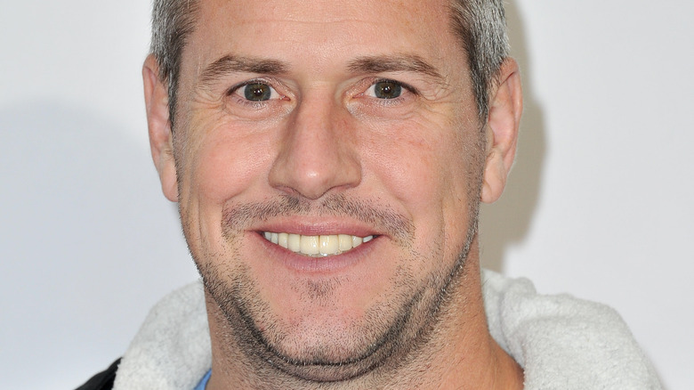 Ant Anstead smiles in a hoodie